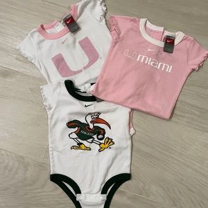 Baby girl Univ or Miami onesies